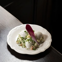 Le Cochon à l'Oreille